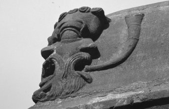 Detail of horned mask motiff.