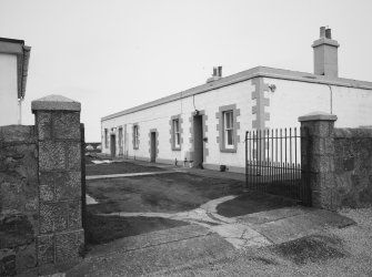 Aberdeen, Greyhope Road, Girdleness Lighthouse.
View of gates to compound and range of building at S end of compound containing dwelling at West end, dated 6 May 1992.