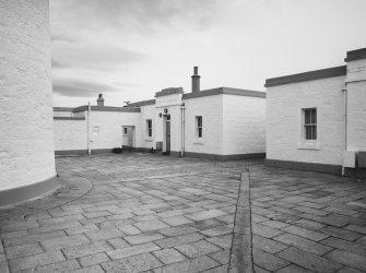 Aberdeen, Greyhope Road, Girdleness Lighthouse.
View from North-East of courtyard (with granite setts) and keepers' houses, dated 6 May 1992.