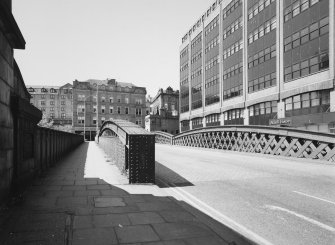 Aberdeen, Guild Street Bridge
View of bridge at deck level from north east, showing central bow trusses and cast-iron outer pedestrian parapet, with ashlar pier (foreground left)