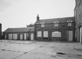 Range to south of courtyard, view from north