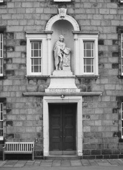 View of statue of Robert Gordon above the main door.