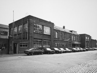 Aberdeen, York Place, Hall Russell Shipyard.
General view from North of office block frontage onto York Place, with main works gate on left.