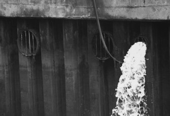 Aberdeen, York Place, Hall Russell Shipyard.
Detail of outlets for dry dock pumps. The two large pipes on left of discharging pipe are from the main pumps (pipes 0.53m diameter). The pipe in use is from an automatic seepage pump.