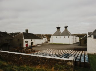 Ardbeg Distillery
General view from SE of two kilns at S end of E maltings, the two kilns having recently been converted into a Visitors Centre following the takeover by Glenmorangie