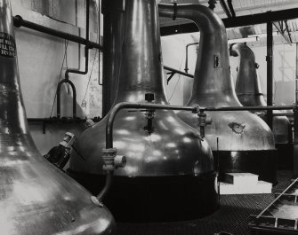Bowmore Distillery, Bowmore, Islay.
Interior of Still House, detail of stills.