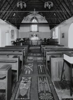 Interior. View from W to chancel showing carpet designed by R H H Montgomery