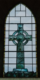 Interior. E window stained glass depiction of Kildalton Cross designed by George G Kirk of Glasgow and gifted by Commander J R C Montgomery