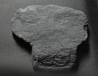 Fragment of cross-head, Kilchoman Parish Church.
View of fragment, reverse (KG 18)