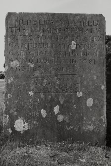 Headstone to Mary Curie, 1826, Kilchoman Church.
View of headstone, insc: 'Here lies interred the  remains of Mary Currie, spouse to Alex Campbell late tenant gartchaia, who died Anno Domini MD CC 87 aged 88 years. Erected by her Grandson J. Mc.Intyre, 1826'