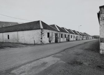 Islay, Port Ellen Distillery
View from SW showing the SW corner of the N block of bonded warehouses at the E end of the distillery