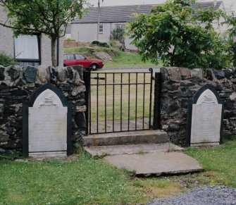 Detail of N gate and Campbell Family gravestones