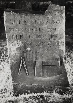 Jura, Cill Earnadil.
View of Mason's headstone with inscription, square and dividers.
Part Insc: 'of AlexR Mc Isaac who departed this 3 May 1811 aged 29 years'.