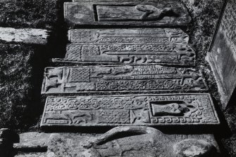 Effigies and grave slabs from churchyard of Kilkivan Old Parish Church.
