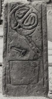 Keills Chapel, West Highland stone.
View of fragment of West Highland cross-shaft in daylight.