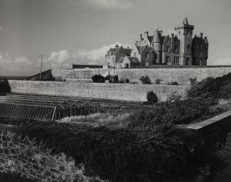 Mull, Glengorm Castle.
General view from South-West showing walled garden.