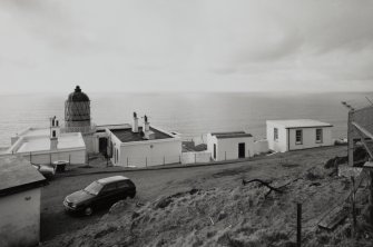 General view from E of lighthouse and associated buildings