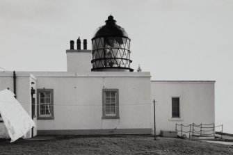General view from N of lighthouse, showing top of tower and lens