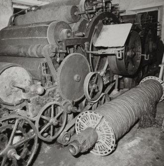 Redhouses Woolen Mill, Islay.
Detail of wooden framed two cylinder carding machine.