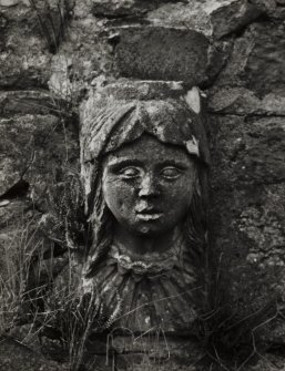 Mull, Torosay Castle. 
Detail of carved head set into garden wall.