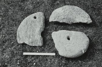 Oronsay Priory.
Detail of three quern-stone fragments preserved in Prior's house.