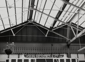 Oban, Railway Station, interior.
Detail of roof structure, with old 'John Menzies & Co. Ltd' sign.
