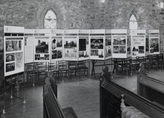 View of World of Worship exhibition panels in nave