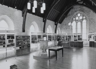 View of World of Worship exhibition panels in entrance lobby