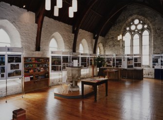 View of World of Worship exhibition panels in entrance lobby