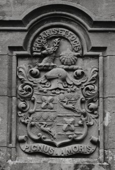 Detail of armorial panel over main entrance.