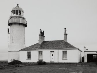 General view of lighthouse and principle's house from East.