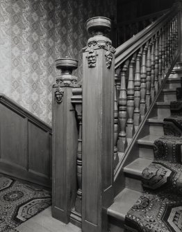 Interior
Detail of first and second floor half landing showing newels and balustrade.
