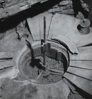 Interior.
Detail of North-East millstones on first floor showing damsel spindle and bedstone.