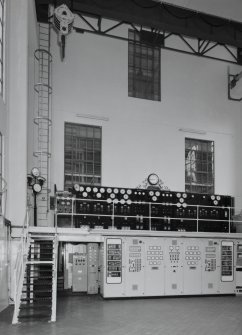 Interior. View of turbine hall and swithgear/control panels from SE, with Arrol overhead crane above