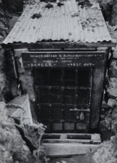 Detail of old gate from Achieson House, Canongate, Edinburgh sunk into entrance to mine.