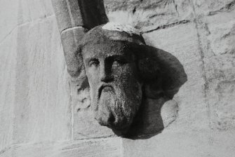 Detail of carved head at main entrance.