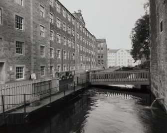View from SE of lade as it passes in front of Mills No. 3, 2 and 1