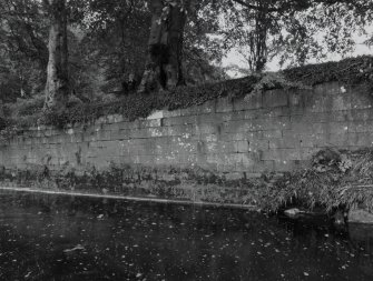 Detail of retaining wall on river bank adjacent to mill lade