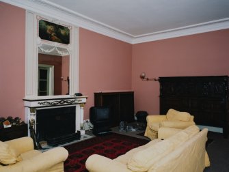 Interior, view of drawing room from West showing Jansen designed fireplace and overmantle