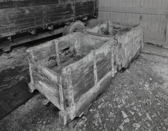 Interior.  Detail of two examples of typical wooden tubs used to transport the stone from the working faces to the pit bottom, and around the tub circuit at the surface.  The tubs were made of wood to minimise damage to the stone.