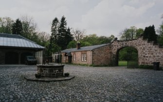 View of courtyard from E with central well