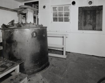 Interior view within building PZ1, (a Nitroglycerine/ Nitrocellulose Mixing House (NS 2885 3984)), showing mixing vessel used to mix NG and NC with blackboard (right) used to record details of batches of wet mixed pastes