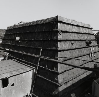 Elevated view from SW (in rope-way gantry) of Cartridging House (AZF3)[NS 2879 3970], showing Chilworth Mound (clad in corrugated iron]				