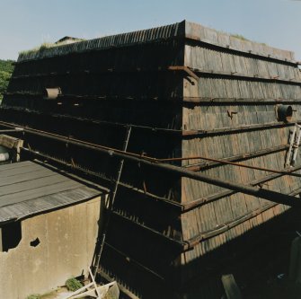 Elevated view from SW (in rope-way gantry) of Cartridging House (AZF3)[NS 2879 3970], showing Chilworth Mound (clad in corrugated iron]				