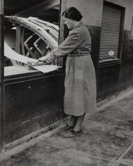 Photographic copy showing an Interior view above drying wheels of Safety Fuse Department.  [Short lengths of safety fuse were used in the manufacture of hand grenades.]