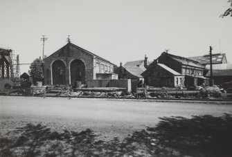 General view from W showing blacksmith's and electrical shop.