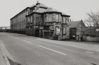 View from WNW of office building, and multi-storeyed mill, photographed 23 April 1992