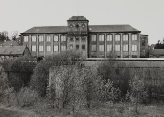 View of multi-storeyed mill from S, photographed 23 April 1992