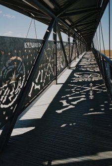 View from SE along E side of deck of bridge