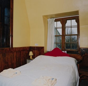 Interior. first floor View of specimen bedroom from E